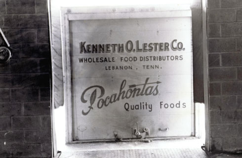 Kenneth O. Lester Co. Food Distributor logo plate
