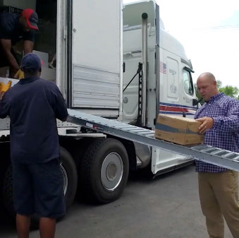 Delivery Personnel Unloading a Truck